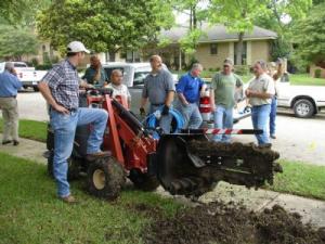 Our North Highlands Sprinkler Repair service also does new line installation with our trencher